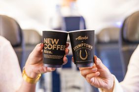 Two passengers on an Alaska Airlines flight toast with Stumptown coffees